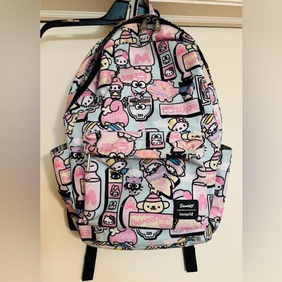 EUC Hello Kitty Loungefly backpack 🎒. Purchased at NYC comicon 🎒✨ - Picture 2 of 6
